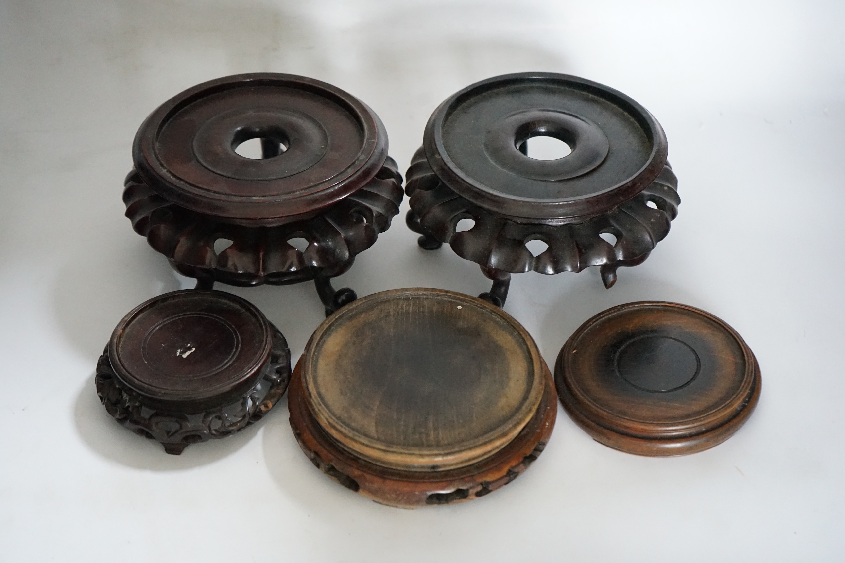 A group of assorted Chinese hardwood vase stands